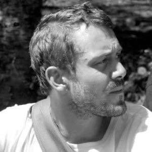 Monochrome tribute portrait of Benjamin B. Jay Nathan, digital architect and founding spirit of Grooveporn Collective